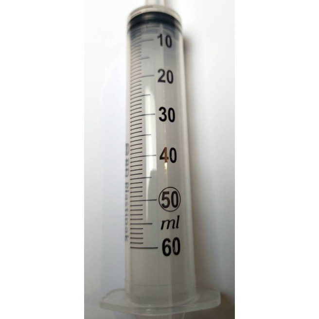 Seringue pour administrer un produit en bouche à un cheval